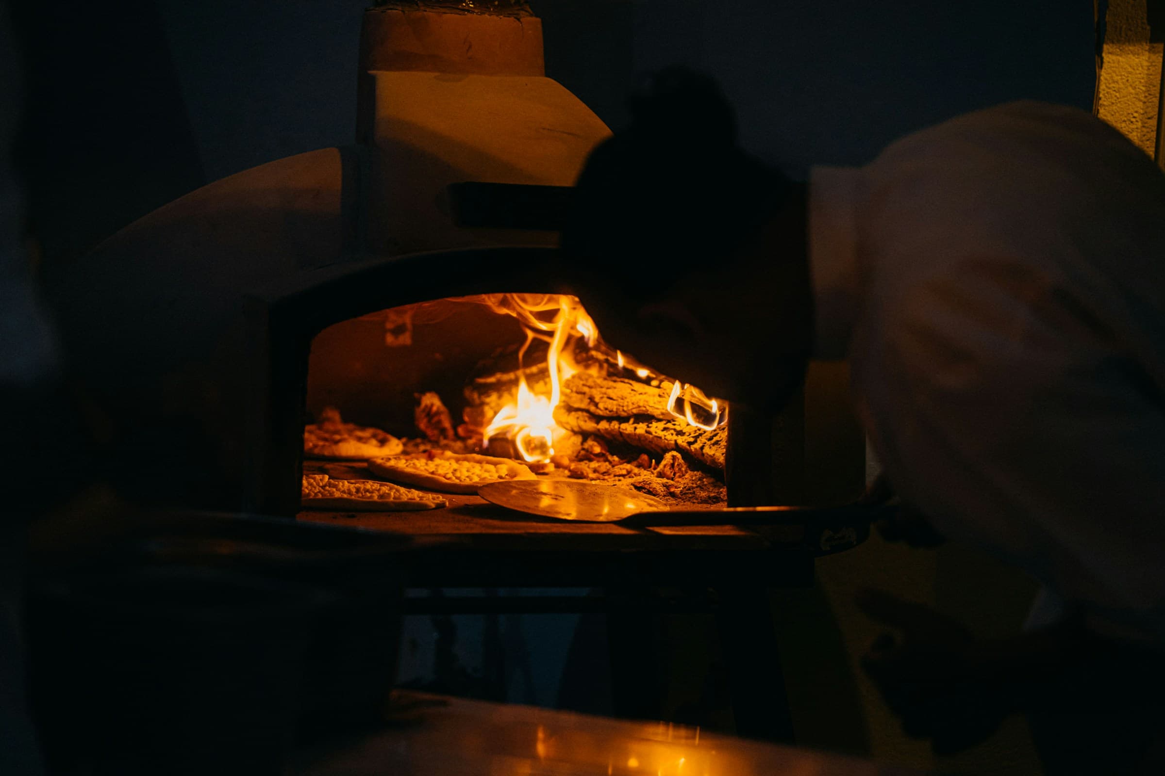 The oven with the branzino going in